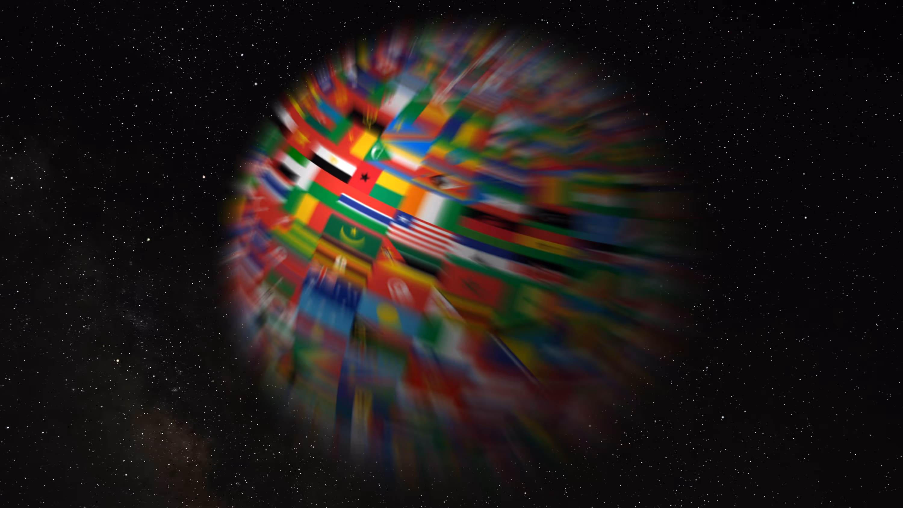 Blurred image of the earth covered in world flags, on a starry background