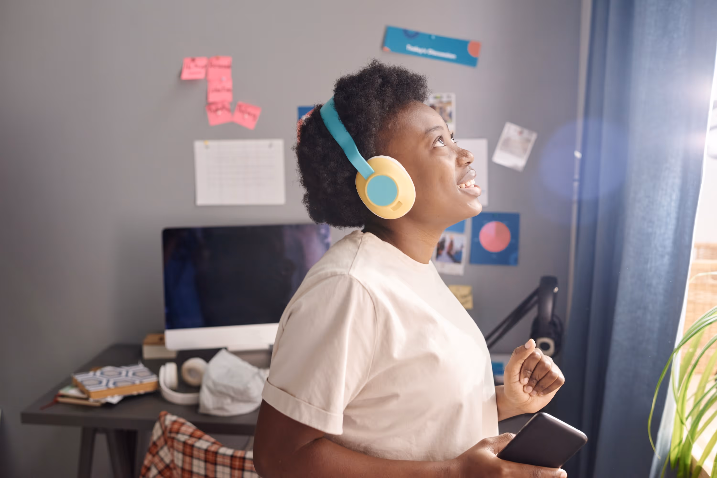 Person smiling with headphones on