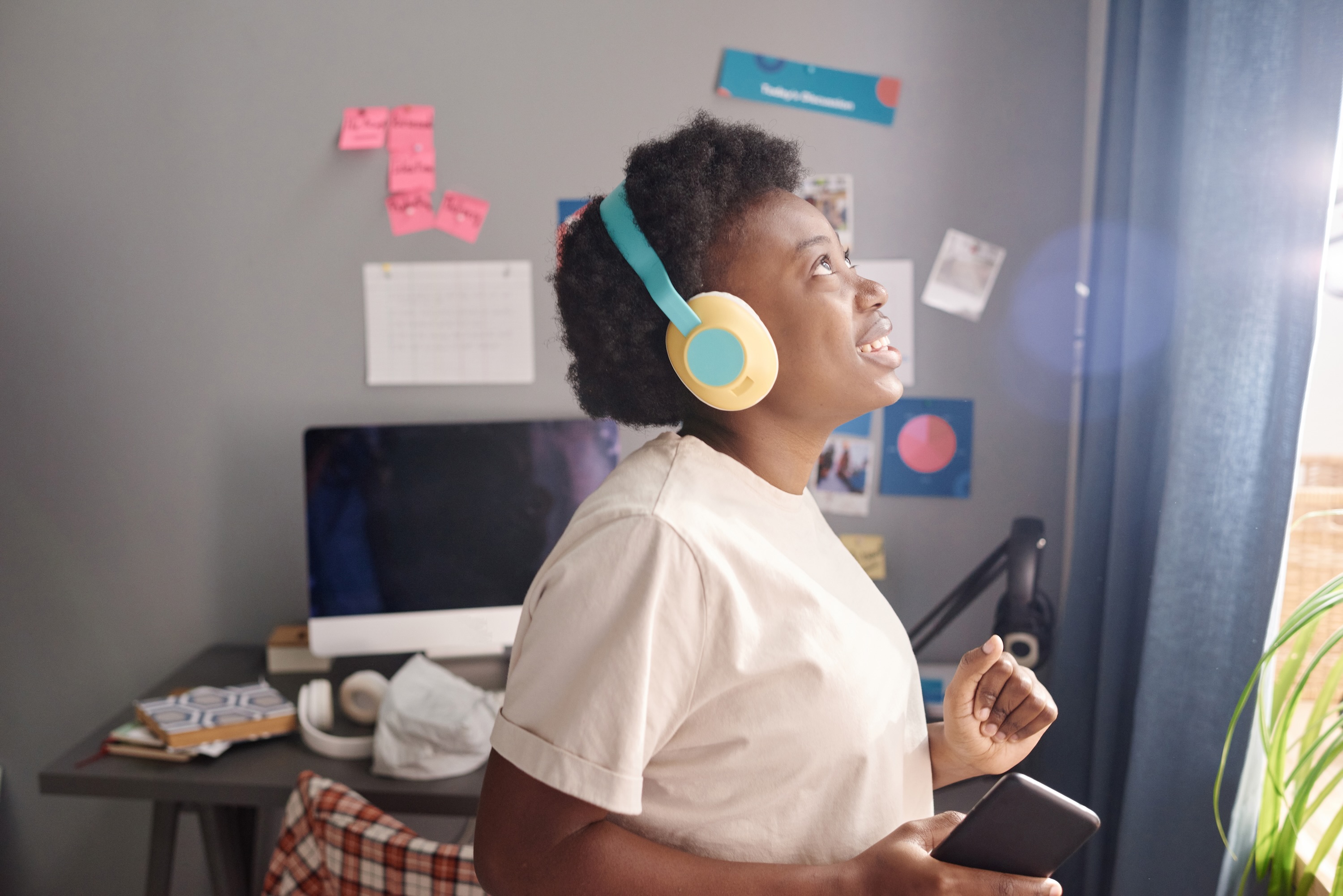 Person smiling with headphones on