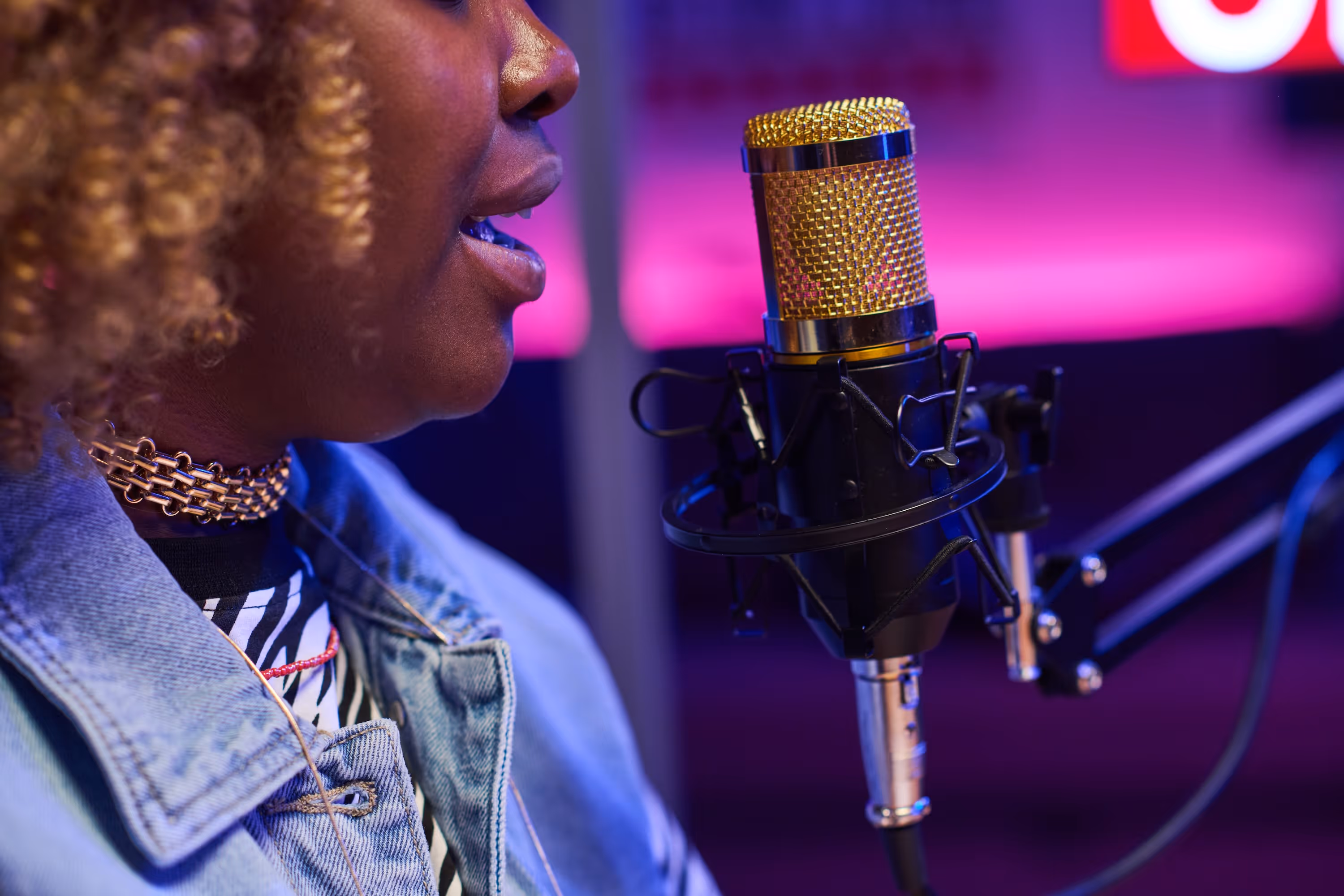 Close-up of woman recording podcast