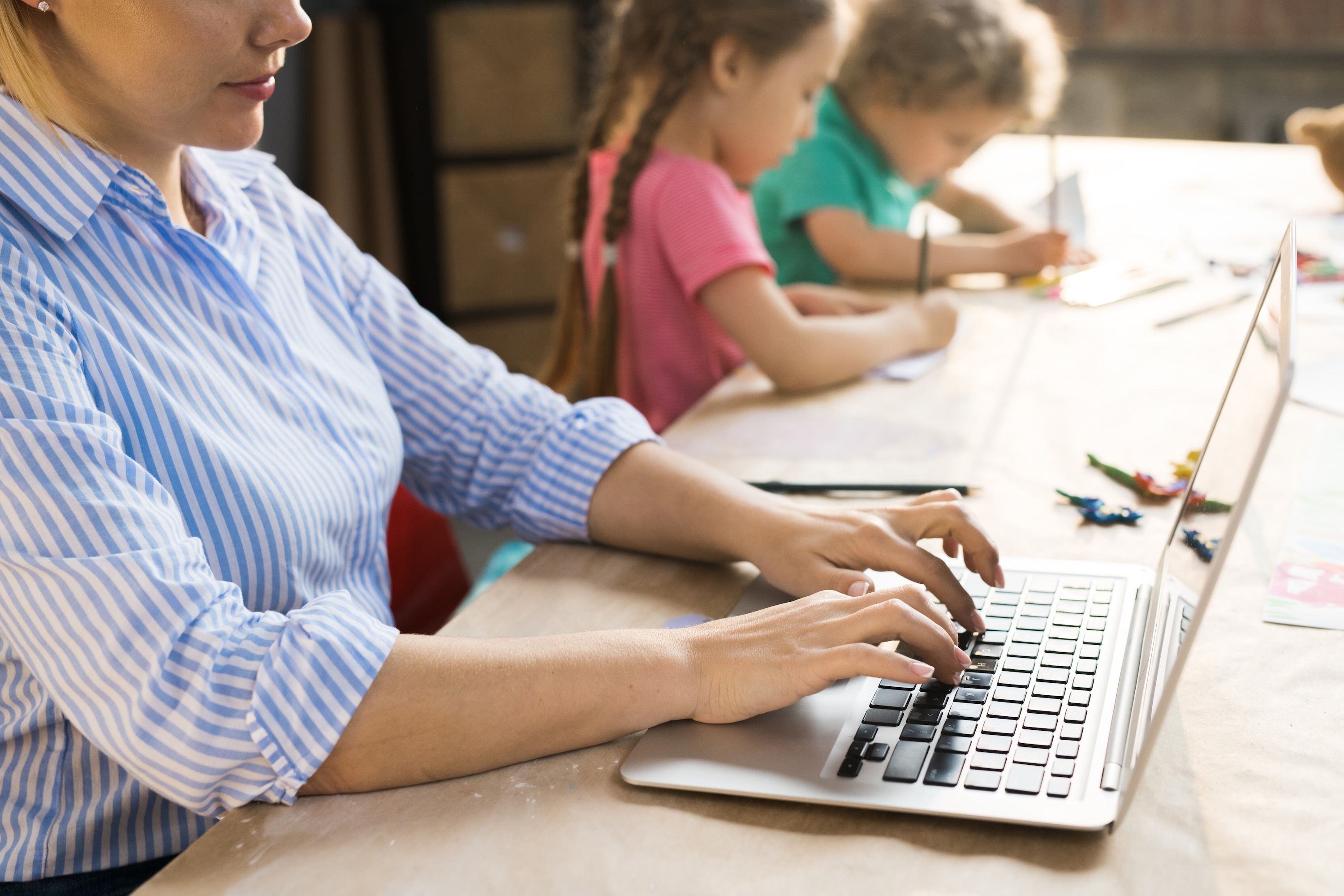 Woman typing on laptop