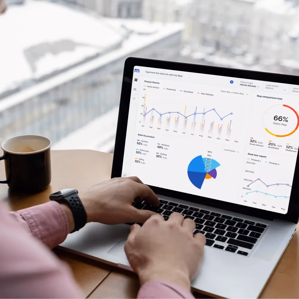 A person using a laptop displays a graph on the screen, illustrating data analysis for an AI-driven content creation platform.