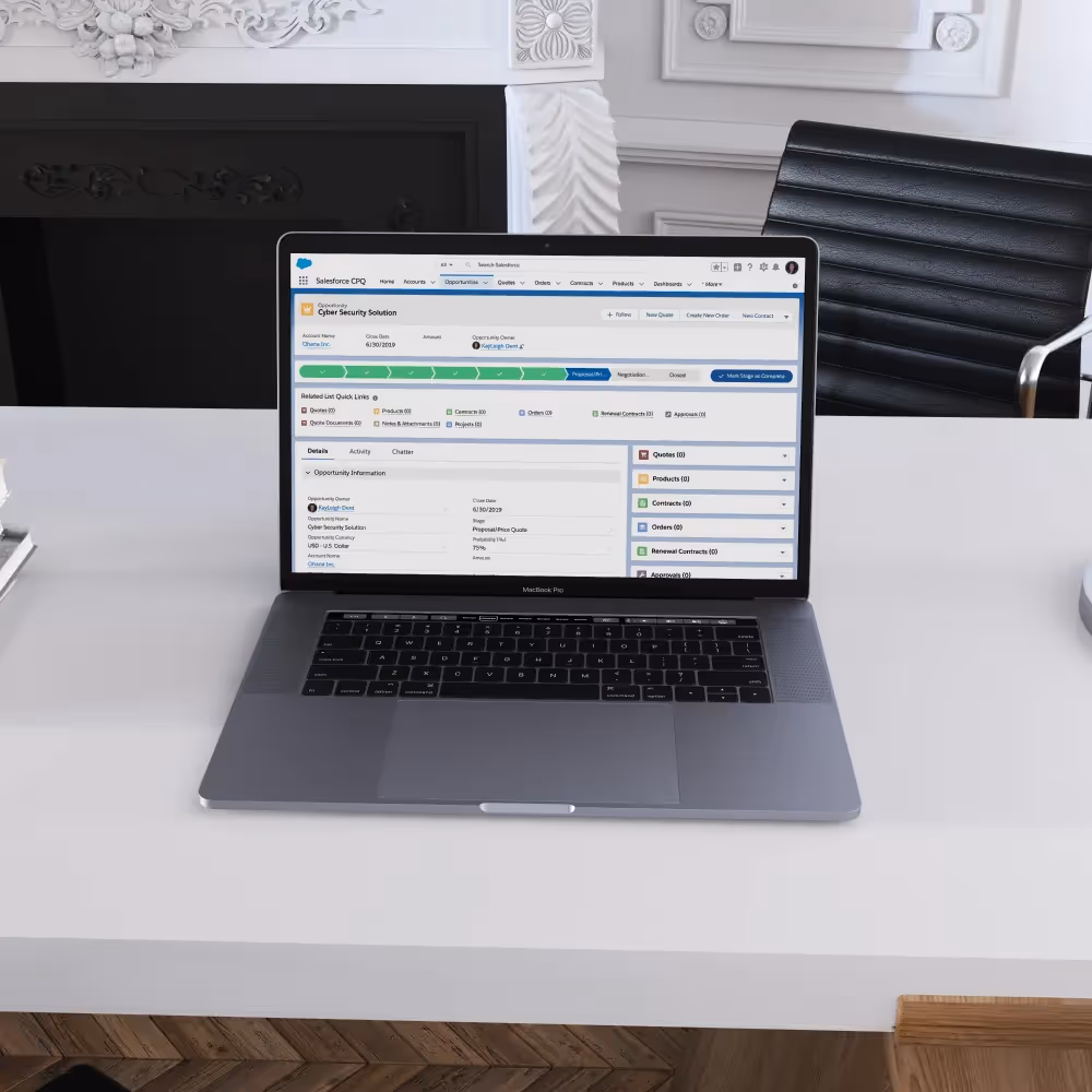A laptop on a desk next to a steaming cup of coffee, symbolizing productivity and modern work environments.