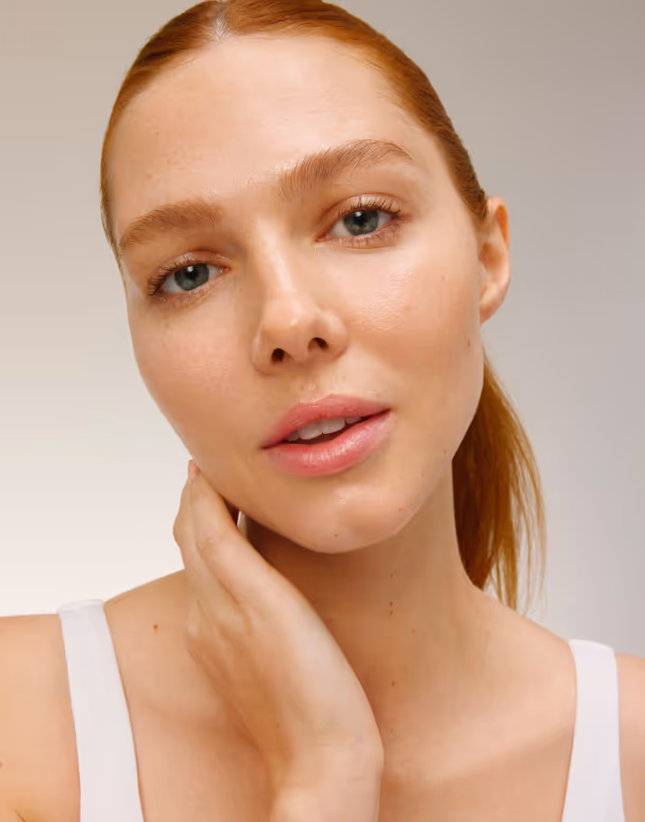 IDC Dermo campaign featuring a gorgeous closeup of a women's face and radiant skin