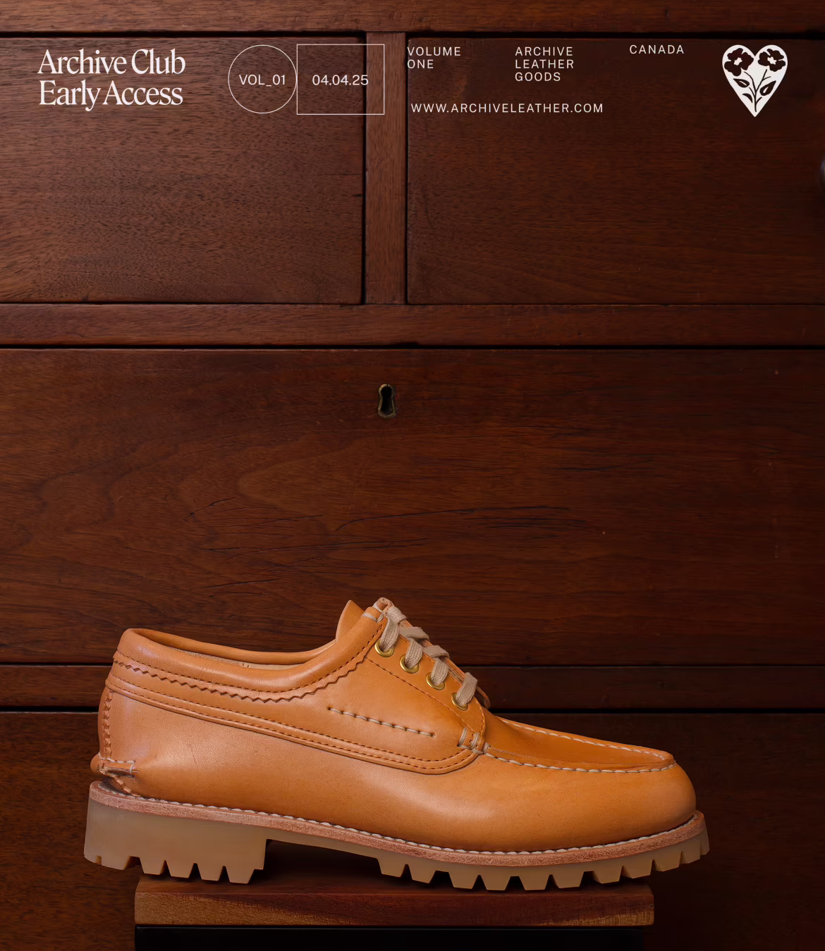 Light brown leather lace-up shoe with thick, rugged sole displayed against a wooden background.