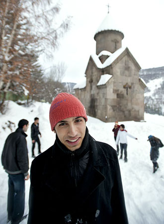 Robert Urutyan and fellow students take a snow break.