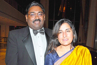 Raj Rajaratnam, at left.