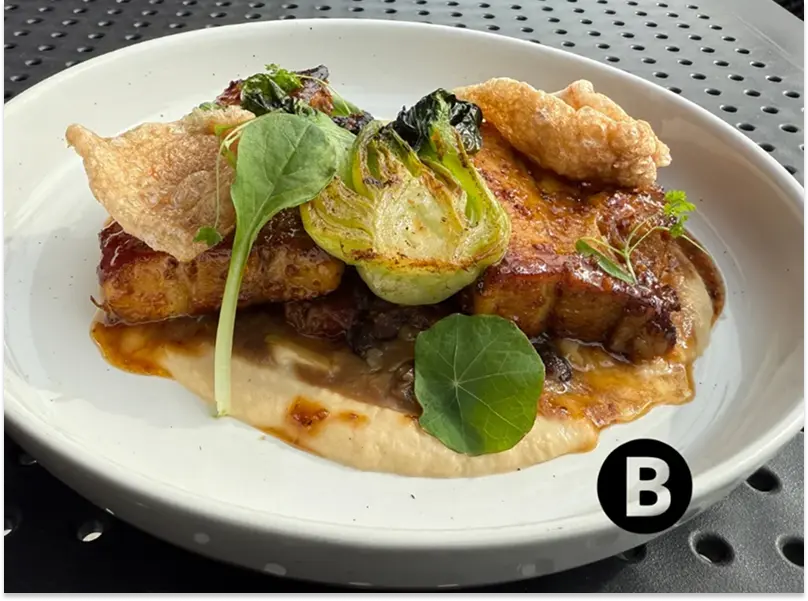 An attractive plate of food from Bushell’s Kitchen, with fresh greens. 