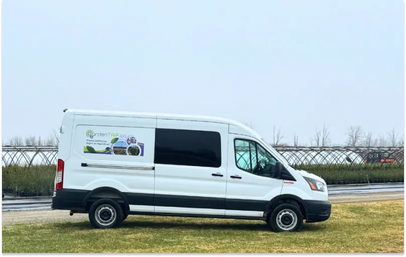 A delivery van with GardenTap branding.