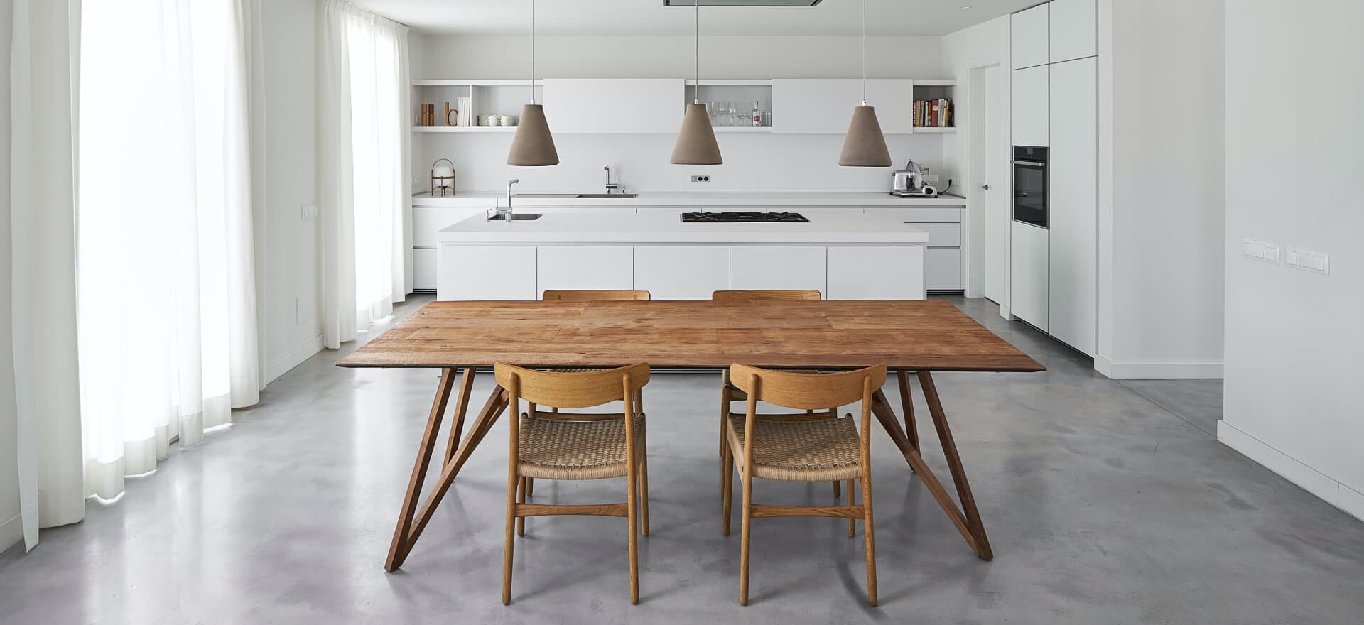 brown wooden table with chairs