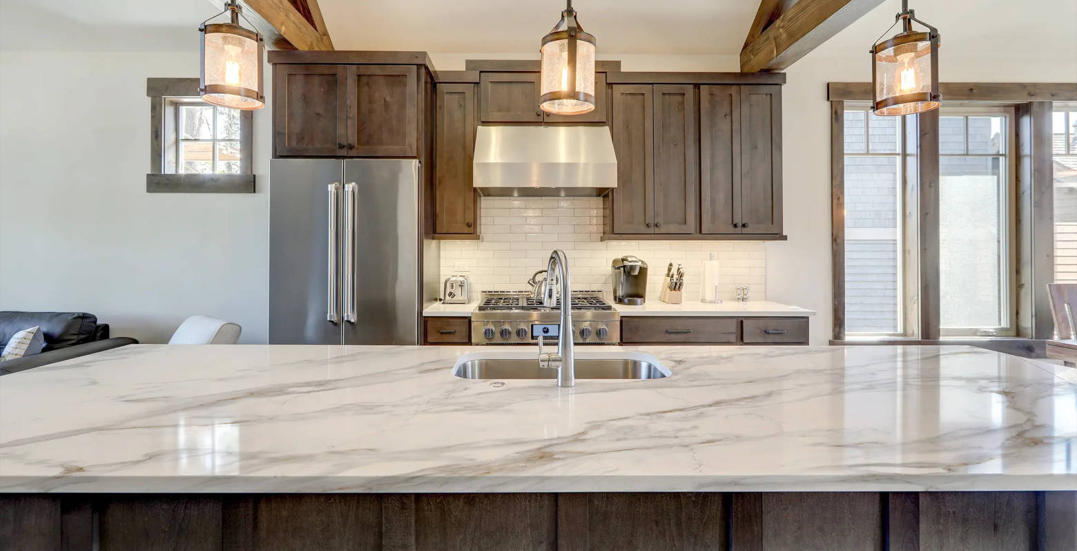 Gray accent kitchen with quartz countertops