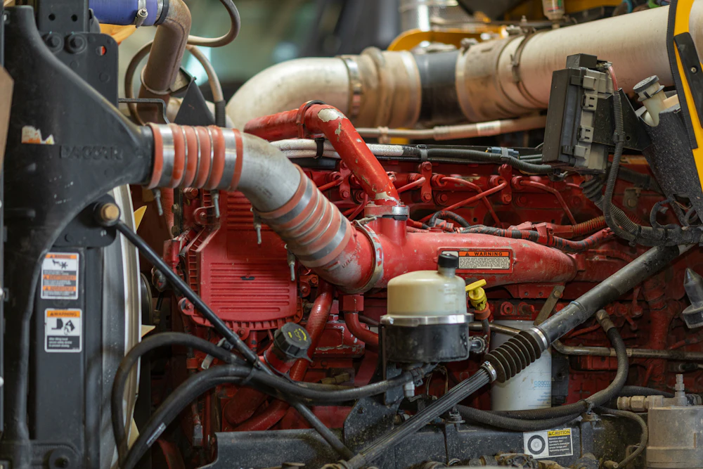 Mechanic performing EGR & DPF services from Patriot Diesel and Automotive
