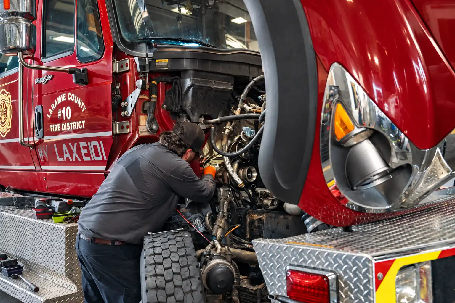 Mechanic performing general diesel repairs from Patriot Diesel Repair