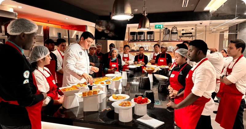 students leaning recipe from icca workshop
