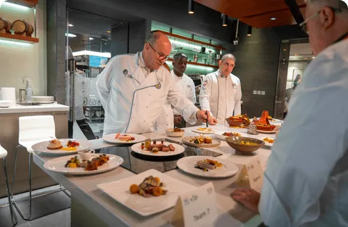 students leaning recipe from icca workshop