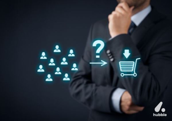 A businessman thinking, with digital icons representing consumer psychology and the decision-making process in brand experiences