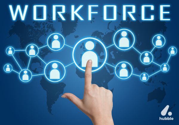 A hand selecting a workforce icon on a digital network, symbolizing AI-driven workforce retention and prediction.