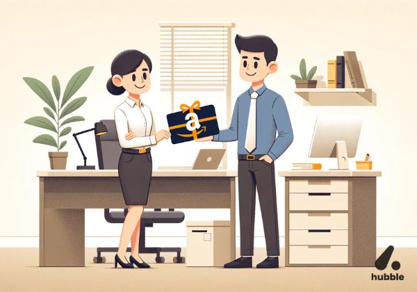 A manager handing an Amazon corporate gift card to an employee in the office.