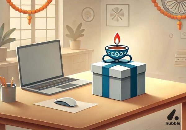 A gift box and traditional Diya placed on a desk in an office