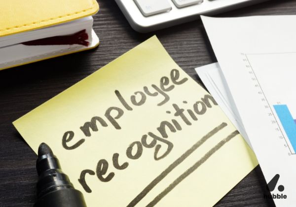 Sticky note with "Employee Recognition" written on it, symbolizing the impact of recognition on workplace performance