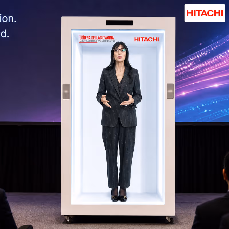 Hitachi leadership appearing live through HoloBox holographic telepresence