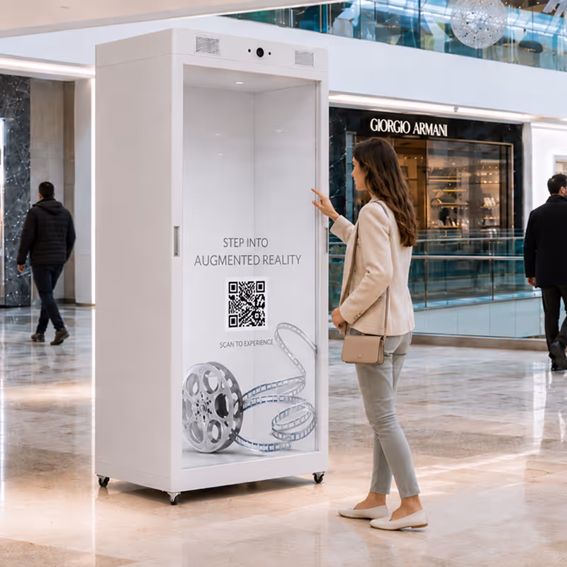 Customer interacting with a life-size HoloBox augmented reality display featuring QR code engagement inside a shopping mall.