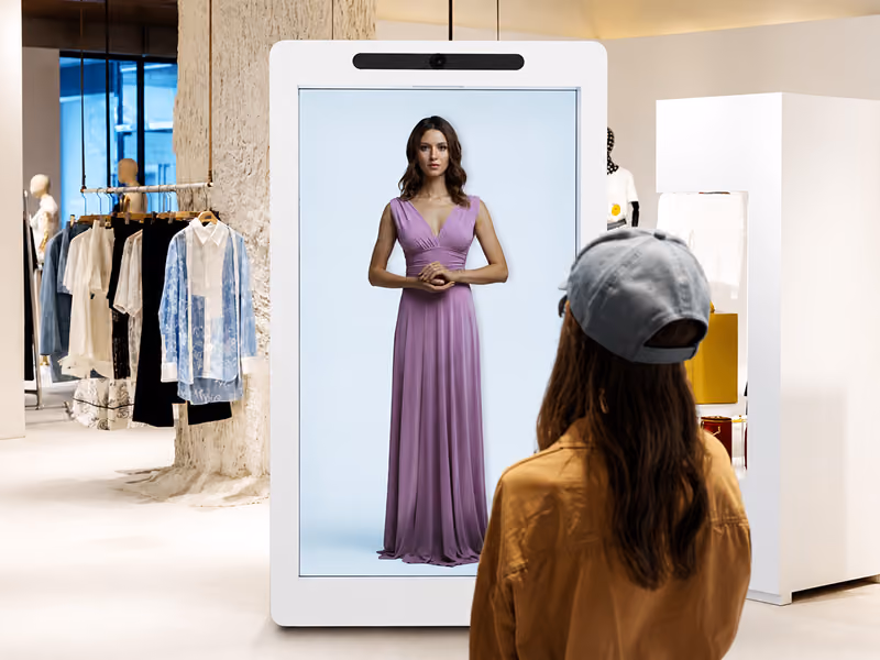 AI-powered HoloBox911 retail associate welcoming shoppers and providing product assistance inside a retail store