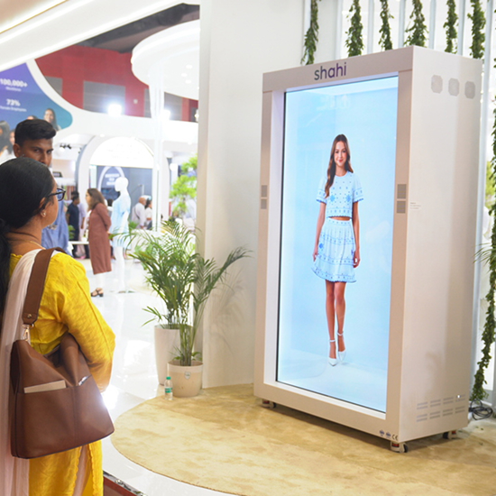 Holographic fashion runway displaying a Shahi garment in HoloBox911