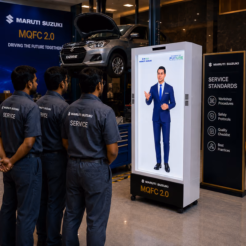 Maruti Suzuki service technicians watching the HoloBox911 avatar present workshop service standards at MQFC 2.0