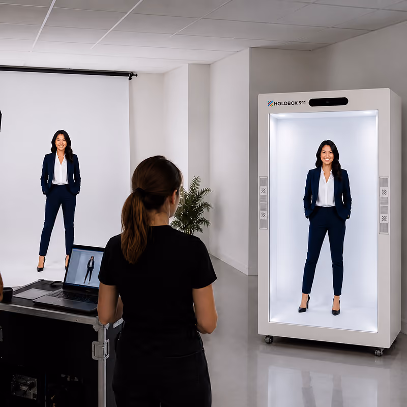 HoloBox delivering real-time holographic telepresence that enables life-size remote presentations, keynote speeches, and interactive live events.