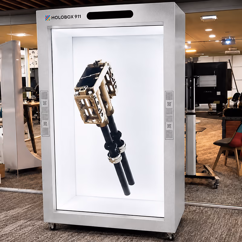 HoloBox911 displaying a life-size 3D holographic automotive component for vehicle launches, dealer events, and interactive product demonstrations.