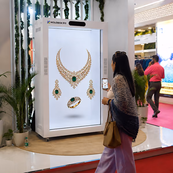 Luxury fashion product displayed as a floating 3D hologram in a retail showroom