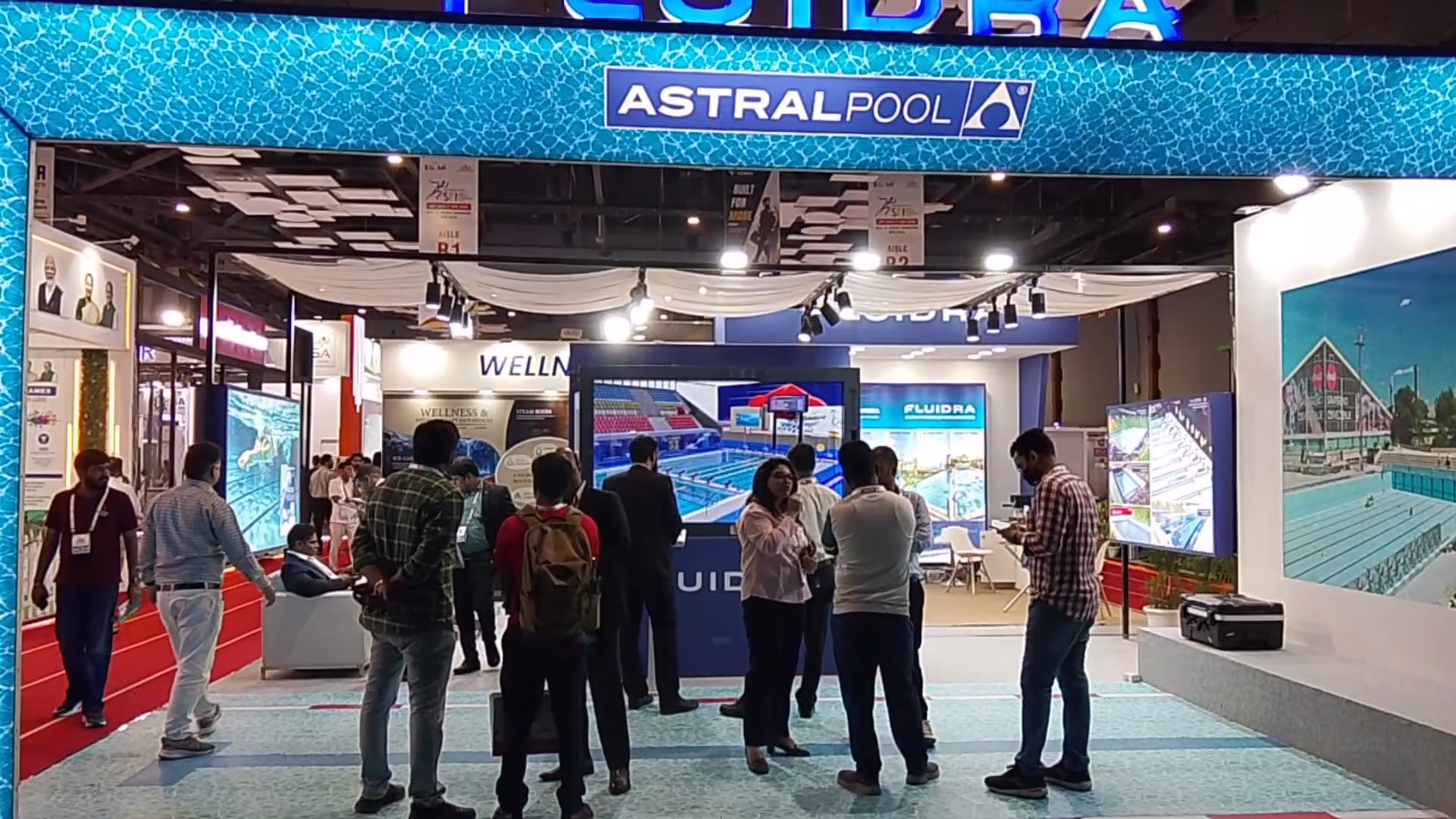 Visitors gathered around the running HoloBox911 display at SFI Expo 2026