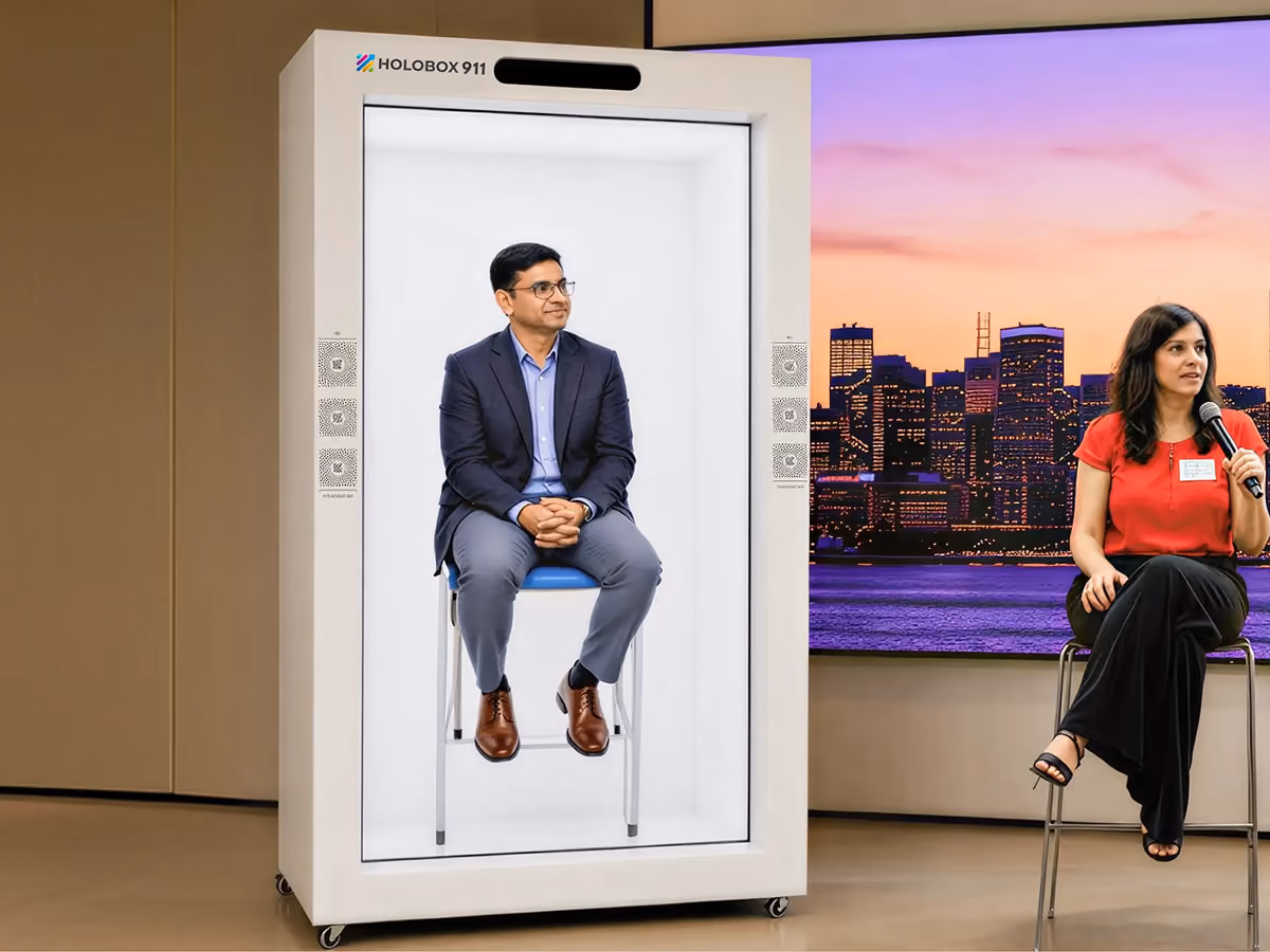 HoloBox 3D hologram display featuring a life-size AI avatar for corporate communication