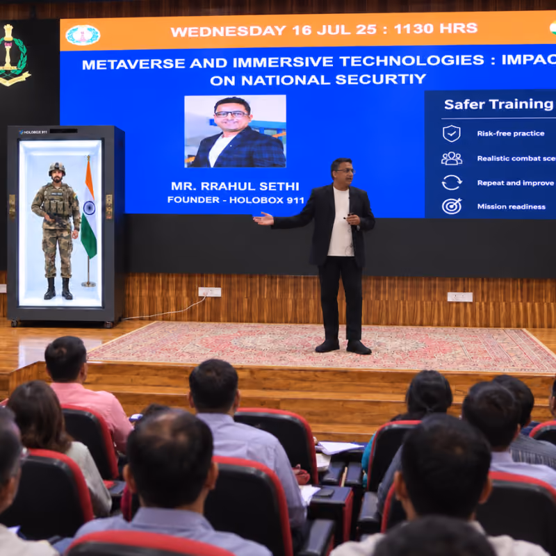 Two remote guest speakers appearing live in HoloBox911 at IMT Ghaziabad