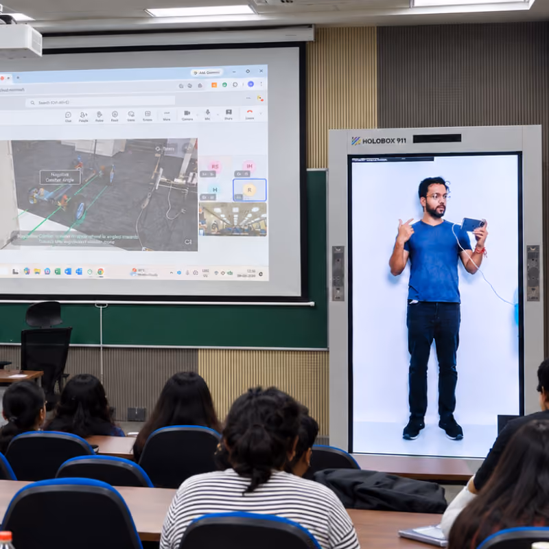 AI avatar hologram welcoming learners at the Maruti Suzuki Vendor Conference Smart Dojo Room