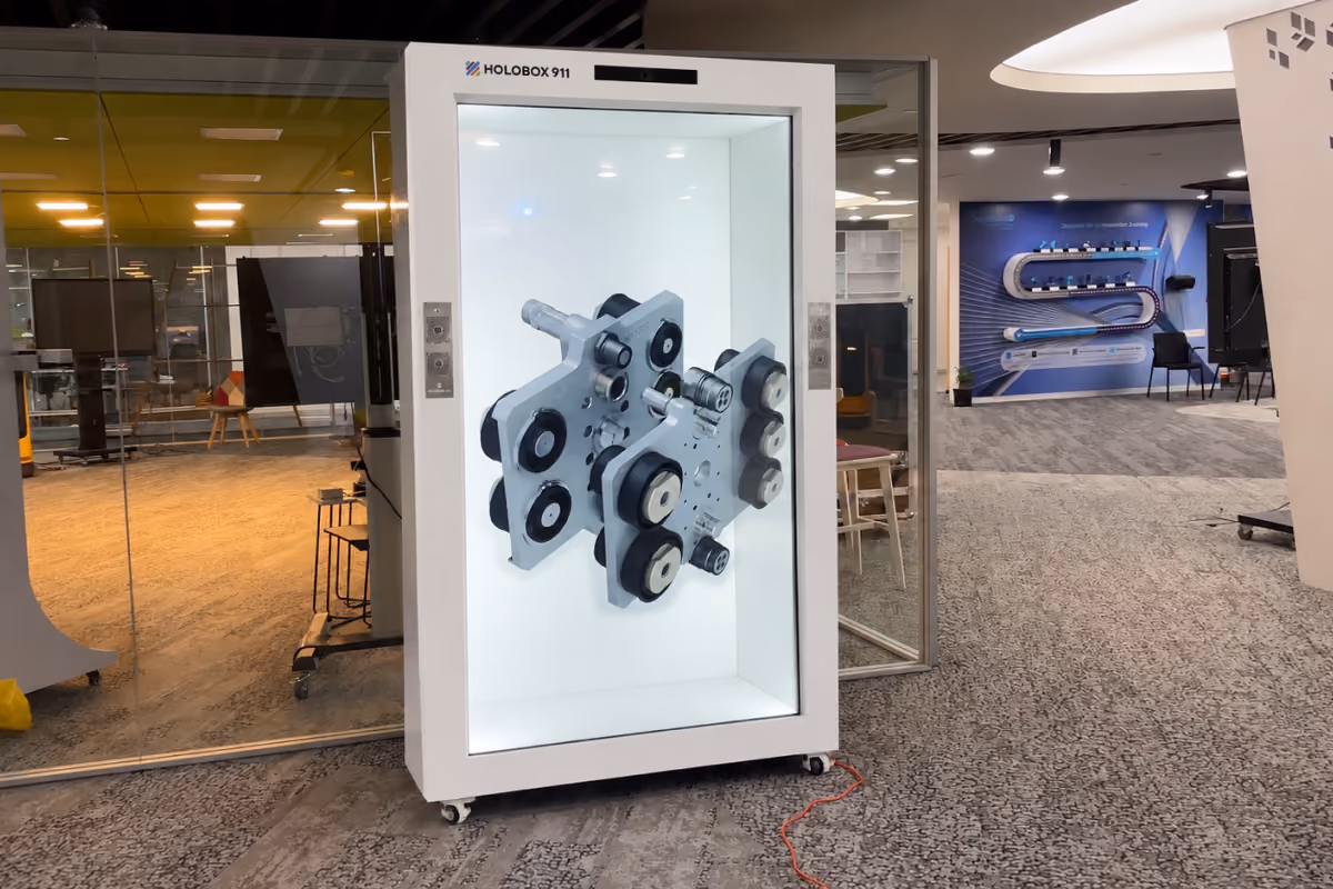 HoloBox911 displaying an interactive 3D product model in a corporate experience center