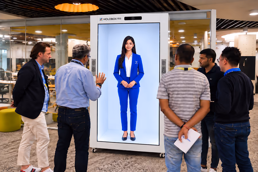 AI hologram receptionist displayed inside HoloBox911 in a corporate lobby