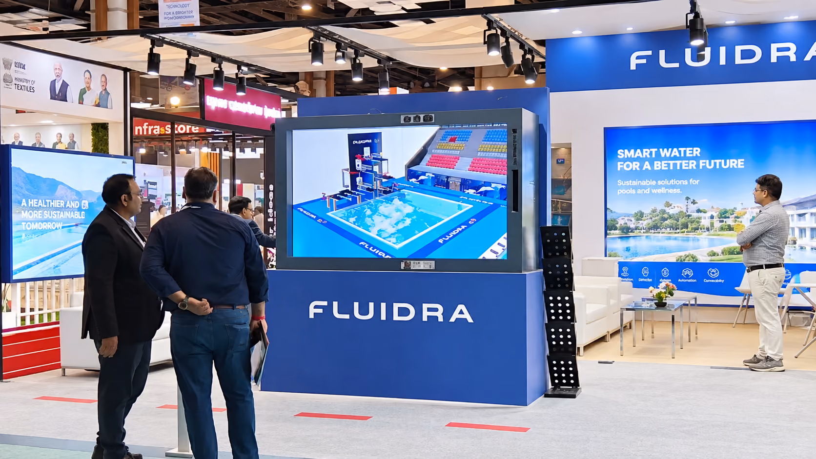 A visitor exploring the diving pool content on the HoloBox911 display at SFI Expo 2026