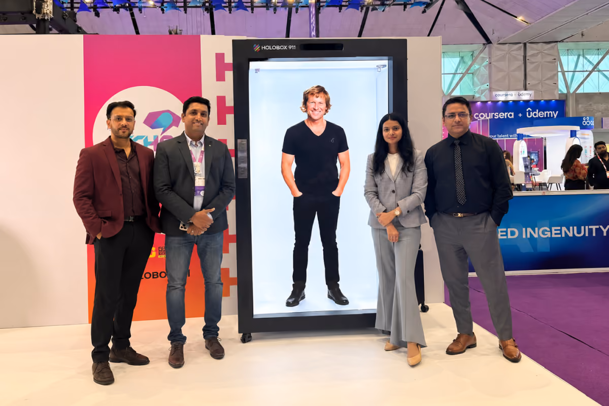 A life-size AI avatar of Jonty Rhodes on a HoloBox911 display at the People Matters TechHR conference