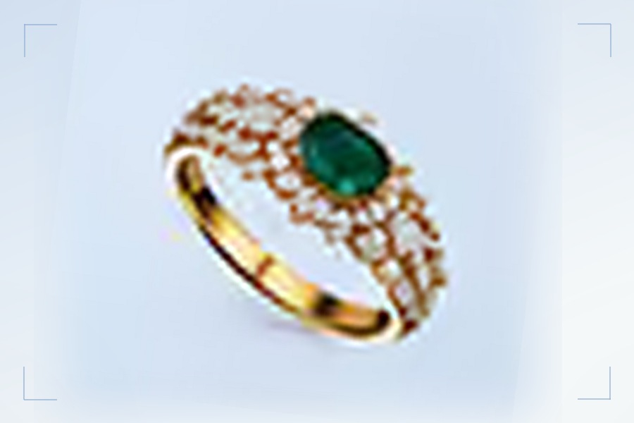 Concept visual: close framing on a gemstone ring bringing the stone and pave detail nearer