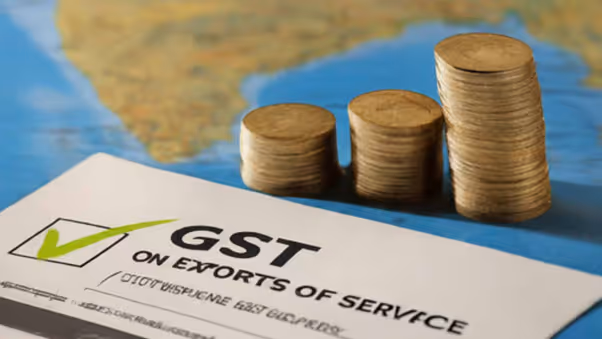 Coins and a map of India with a card displaying the text 'GST on Exports of Service