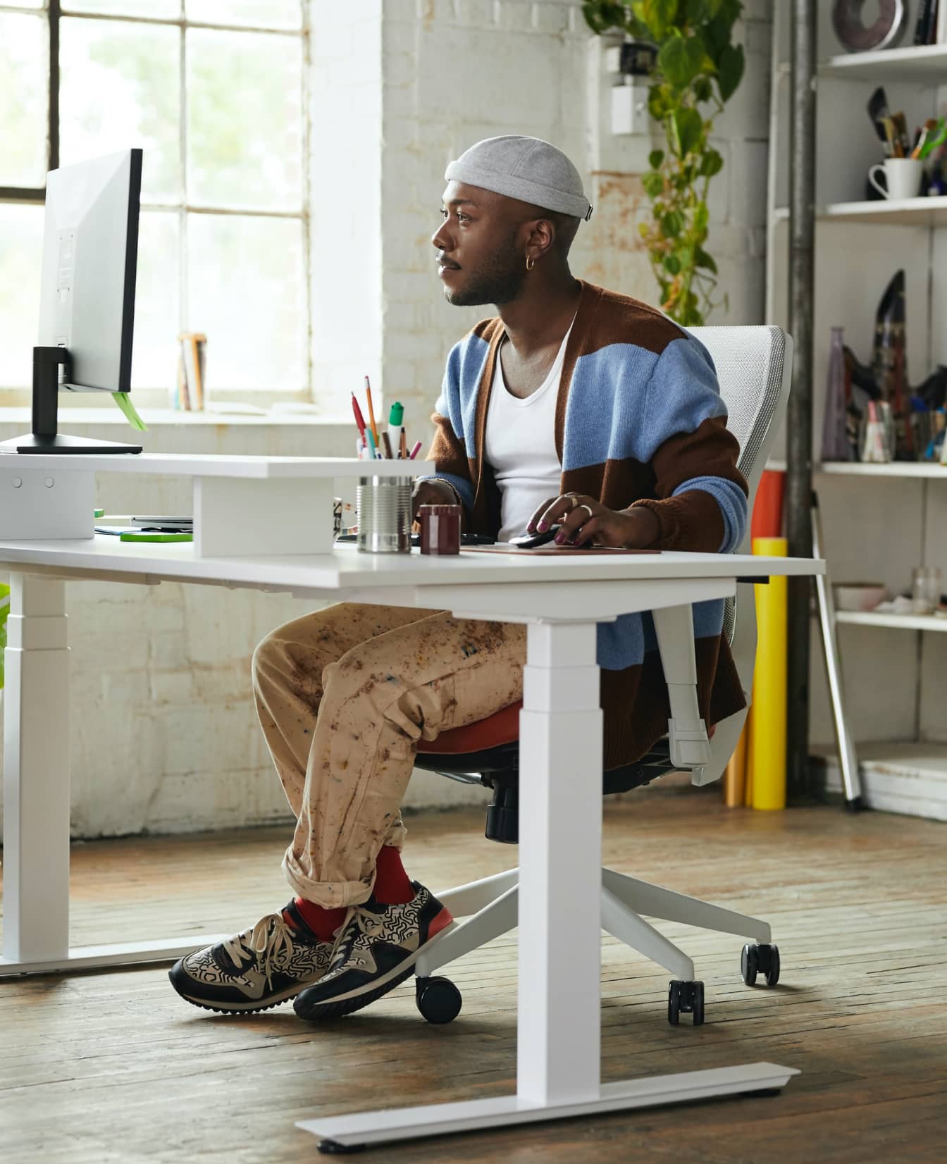 A man working in a home office -Webflow agency - glstudiio