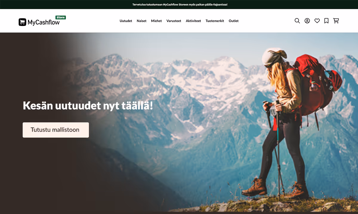 Nainen työskentelee kannettavalla tietokoneella MyCashflow-paita päällä vihreää taustaa vasten.