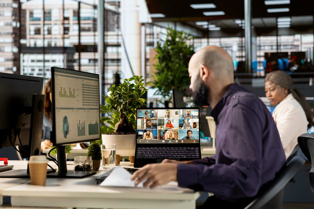 Workplace sharing in a hybrid office.
