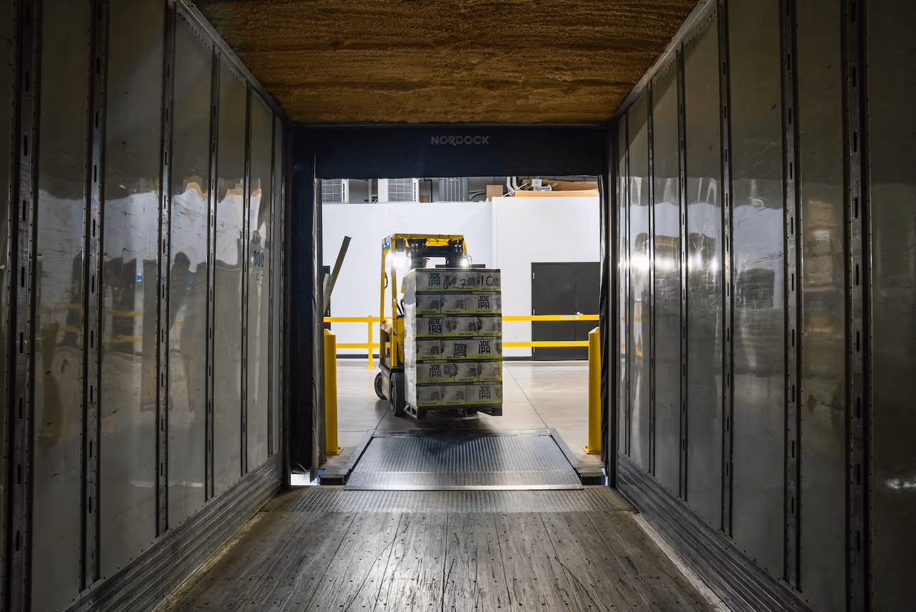 Pickup loading a warehouse