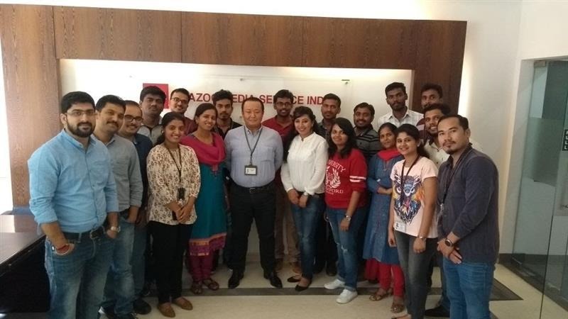 A group of people posing for a photoAI-generated content may be incorrect.