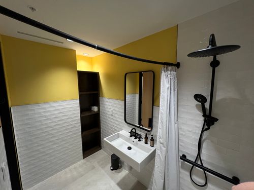 a shower at dandelight yoga studio in delray beach