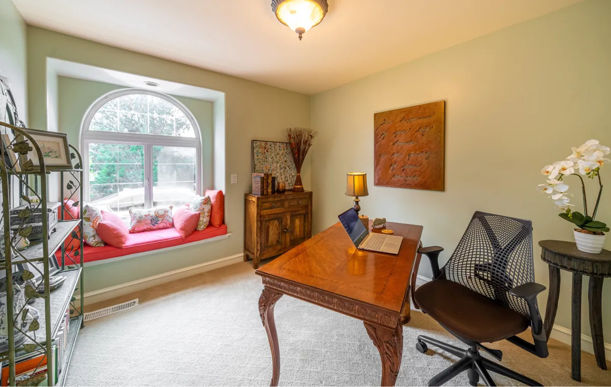 The office (doubles as a third bedroom) and all of it's natural light and cozy reading nook in the window.