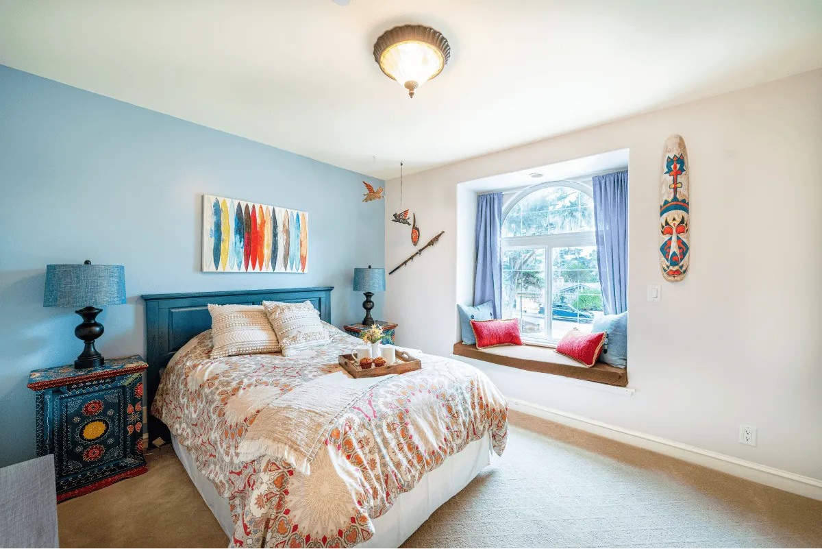 Another view of the second bedroom and the beautiful natural light, a lot of feng shui, and a reading nook.